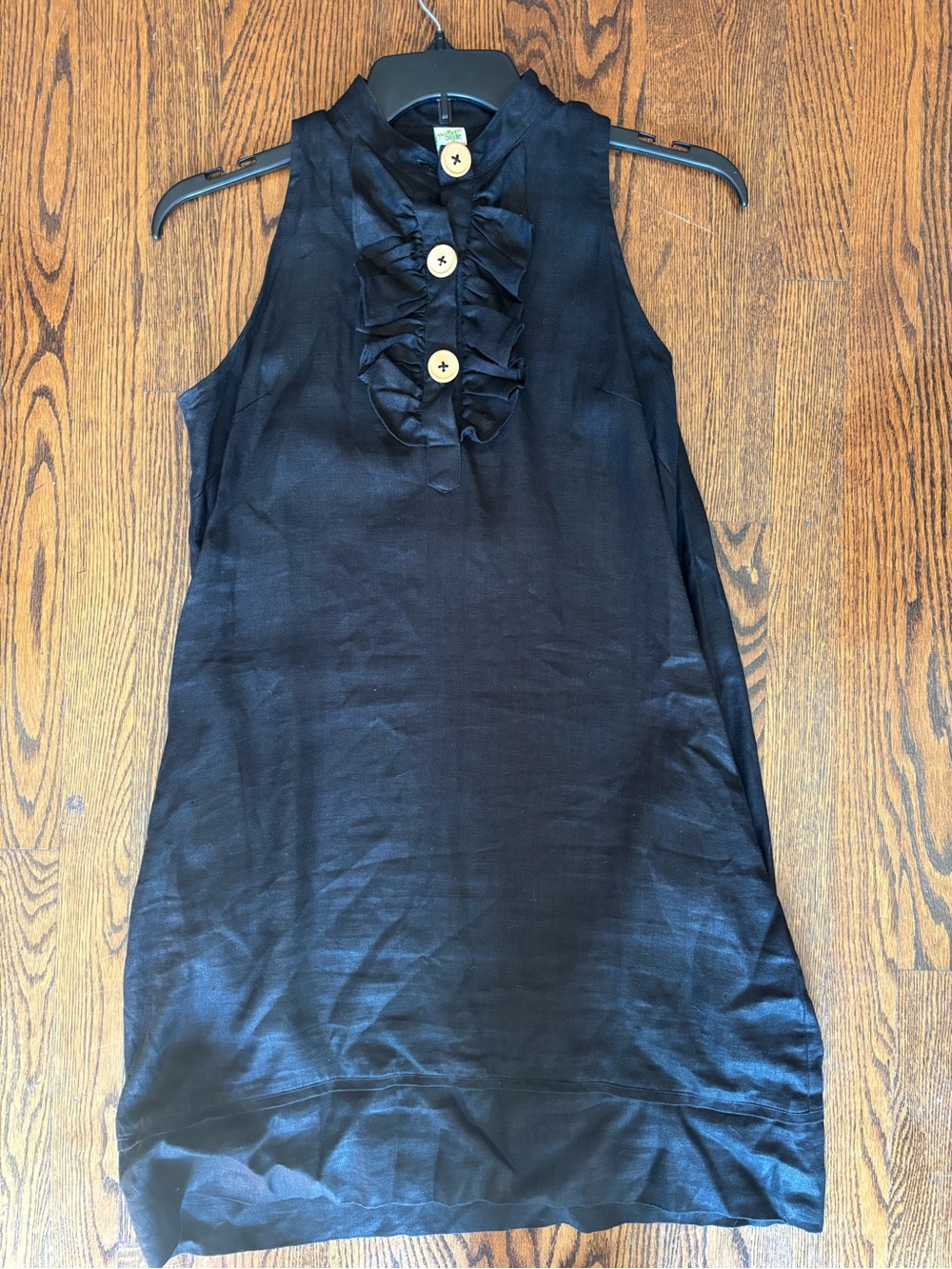 Sleeveless Ruffle-Front Tunic with Decorative Buttons - Black